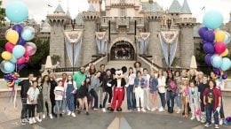 "Disney Channel GO" fans pose with Mickey Mouse, Disneyland park
