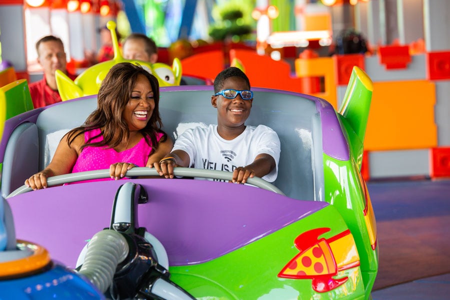 Sherri Shepherd and her son Jeffrey ride Alien Swirling Saucers in Toy Story Land at Disney's Hollywood Studios