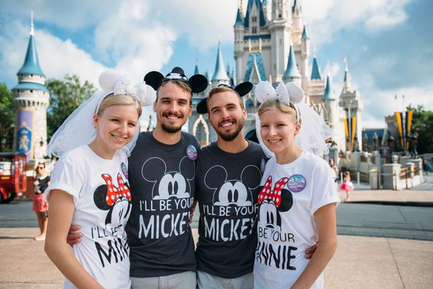 Identical twin couples pose together at Walt Disney World Resort