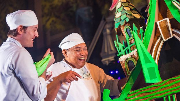 Disneyland Pastry Chefs working on the Haunted Mansion Holiday 2018 Gingerbread House at Disneyland Park