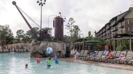 Family playing at the pool at Disney's Wilderness Lodge
