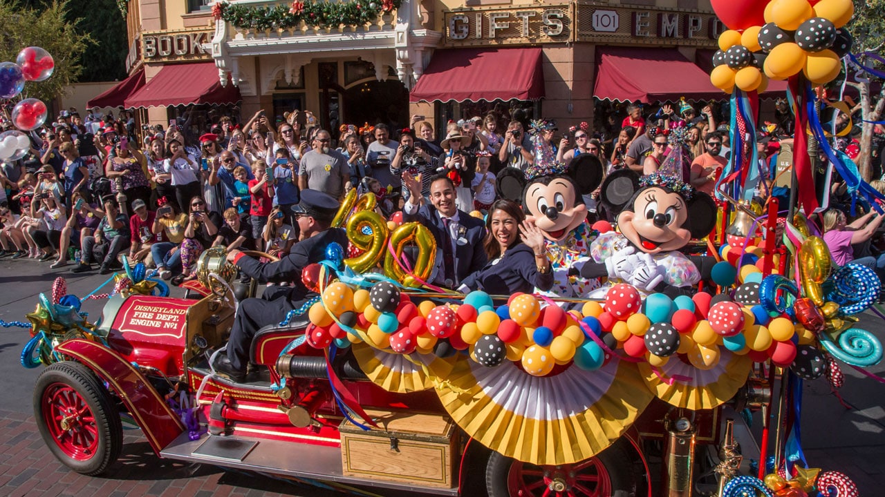 Mickey and Minnie joined a flurry of Disney characters for a festive cavalcade down Main Street, U.S.A. at Disneyland park