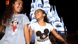 Girls in front of Cinderella Castle during the holidays