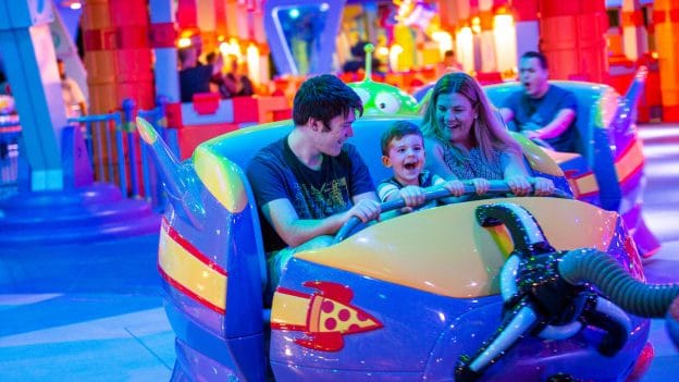 Guest enjoying Alien Swirling Saucers at Toy Story Land