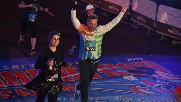 Carlos Ponce crosses the finish line at the 2019 Walt Disney World Marathon Weekend presented by Cigna