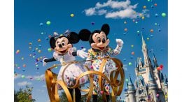 Mickey Mouse and Minnie Mouse in special celebratory outfits – as part of Mickey & Minnie’s Surprise Celebration at Magic Kingdom Park