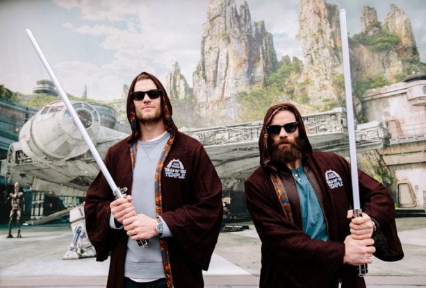 New England Patriots quarterback Tom Brady (left) and wide receiver Julian Edelman (right) celebrated their Super Bowl LIII victory Monday, Feb. 4, 2019, at Walt Disney World Resort in Lake Buena Vista, Fla. As part of their visit, the pair channeled the Force with Jedi robes and lightsabers at Disney’s Hollywood Studios, where the new Star Wars: Galaxy’s Edge will open this fall.