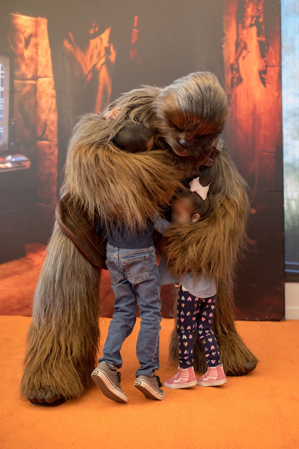 Chewbacca hugs children during ToyFest at City of Hope