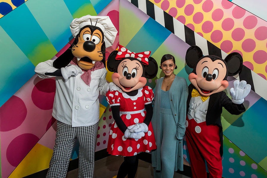 Goofy, Minnie, and Mickey pose with Vanessa Hudgens at Black Tap Craft Burgers & Shakes at the Downtown Disney District at the Disneyland Resort