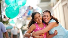 Mom and Daughter share a hug at Disney Parks