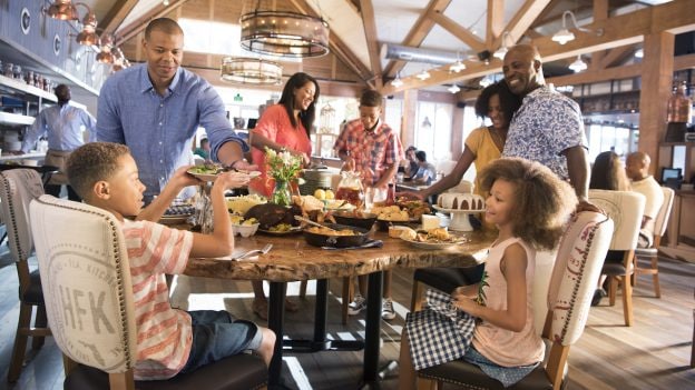 Family enjoying Chef Art Smith’s Homecomin’ at Disney Springs