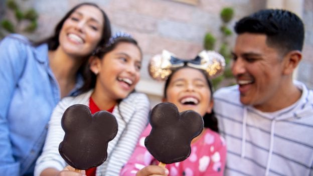 Family with Mickey Ice Cream Bars at Disneyland Resort