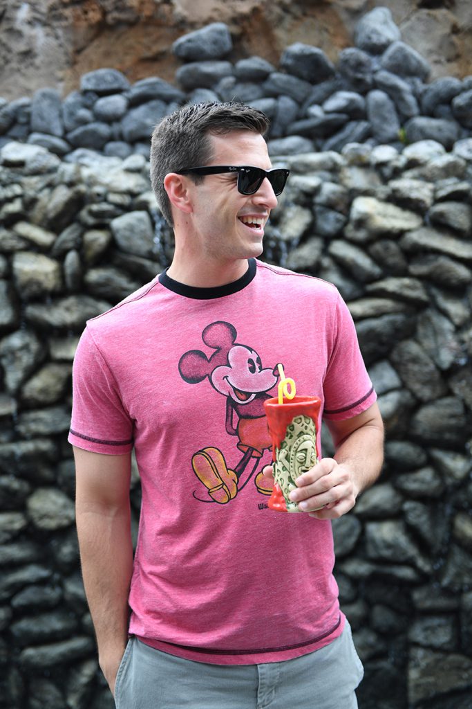 Trader Sam’s Grog Grotto's red Tiki mug and classic Mickey t-shirt