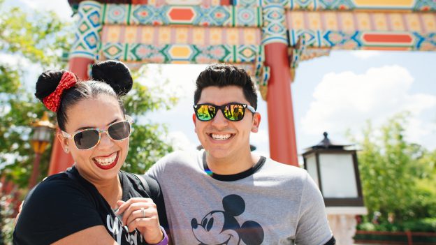 Guests at Epcot wearing sunglasses