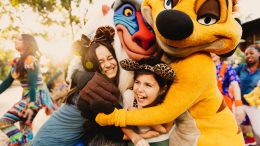 Guests hug Timon and Rafiki