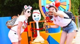 Guests taking a picture with Forky from "Toy Story 4" at Disneyland Paris