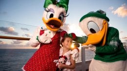 Daisy, little girl and Donald at a Disney Cruise