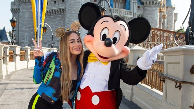 Singer Ally Brooke with Mickey Mouse at Magic Kingdom Park