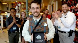 Walt Disney World cast member Kevin smiles with Star Wars: Galaxy’s Edge name tag