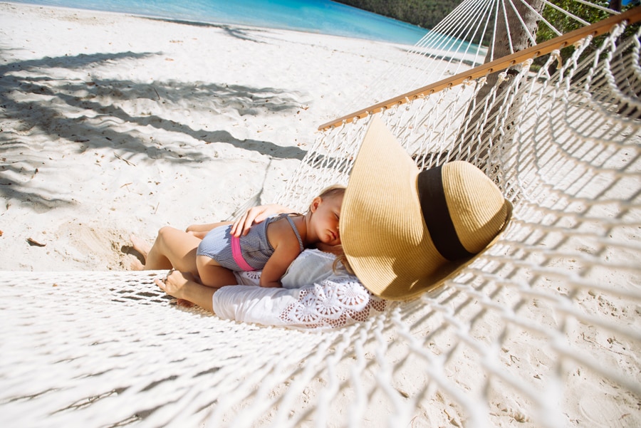 Mother and daughter relaxing in a hammock