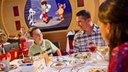 Family have dinner on a Disney cruise