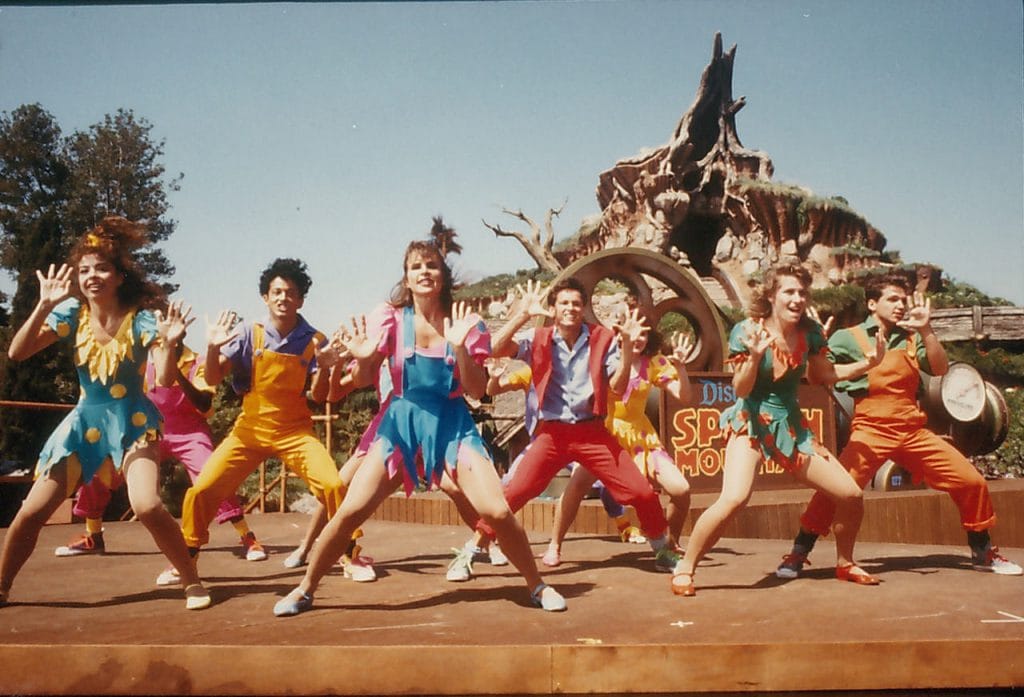 Dancers in front of Splash Mountain at Disneyland Park