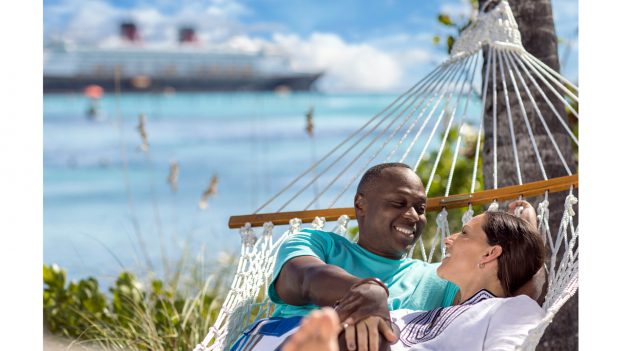 Couple lays in a hammock at Castaway Cay