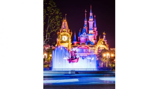 Nighttime photo of Steamboat Willie at Shanghai Disneyland