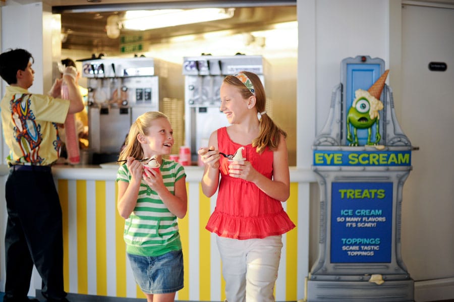 Two girls eating ice cream at Eye scream Treats aboard the Disney Dream