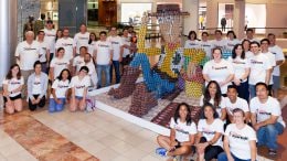 Disneyland Resort Design & Engineering team and Woody made out of cans