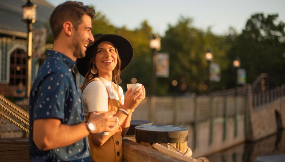 Couple drinks coffee at Walt Disney World