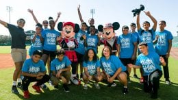 Orlando After-School All-Stars pose with Mickey Mouse and Minnie Mouse at ESPN Wide World of Sports Complex