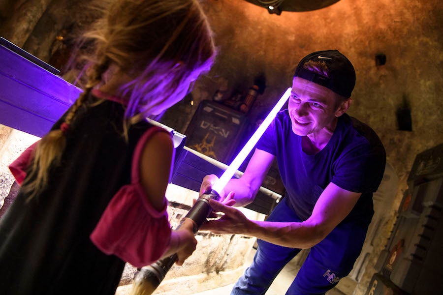 Actor Hayden Christensen shares a moment with his daughter, on her birthday, after building a custom lightsaber in Savi’s Workshop
