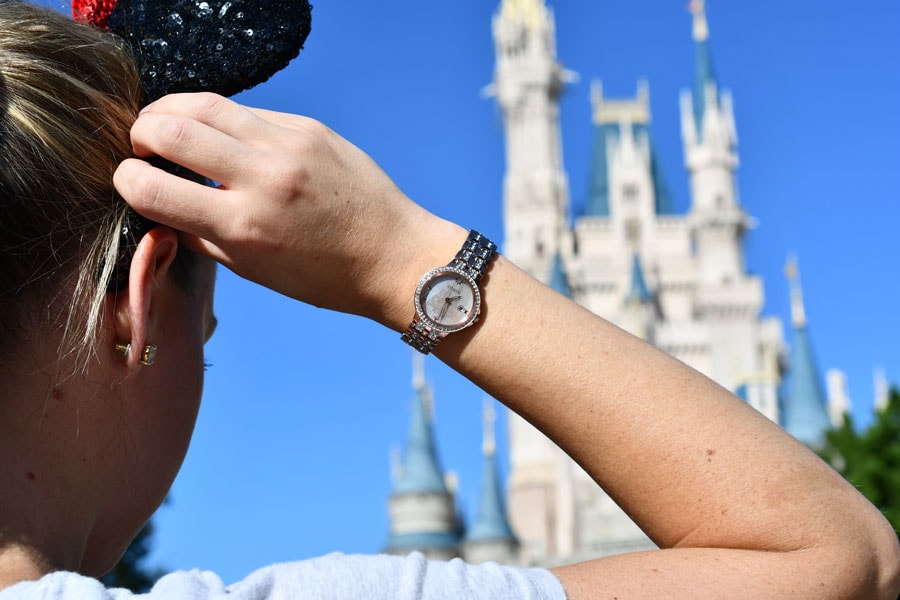 Citizen watch featuring Cinderella Castle modeled in front of Cinderella Castle