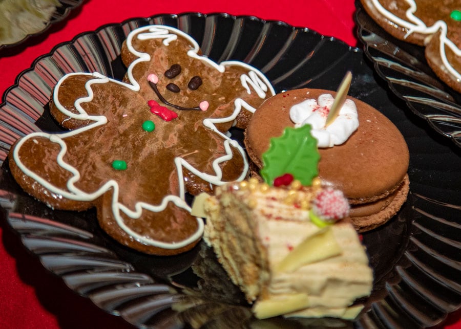 Holiday desserts, including Hot Cocoa Marshmallow Macarons, Churros Yule Logs and Mickey Gingerbread Men