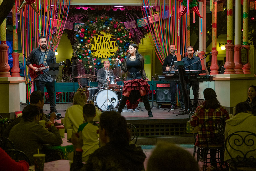 The Tina Aldana Band performs at the Disney Parks Blog Holiday 2019 Meet-Up