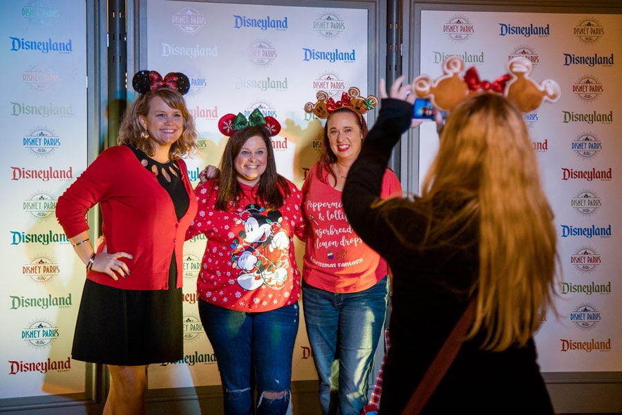 Guests take a photo at the Disney Parks Blog Holiday 2019 Meet-Up