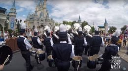 Marching Band marches in front of Cinderella Castle at Magic Kingdom Park as with Disney Performing Arts