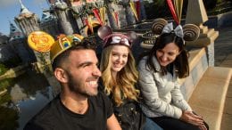 Guests wearing Minnie Mouse ear headbands and Mickey Mouse ear hats at Disneyland Resort