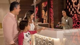 Family checking in to a Walt Disney World Resort Hotel