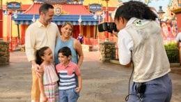 Family using Disney Photopass in Magic Kingdom Park