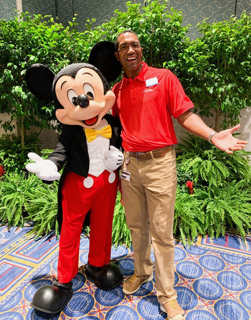 Leonard Spencer with Mickey Mouse