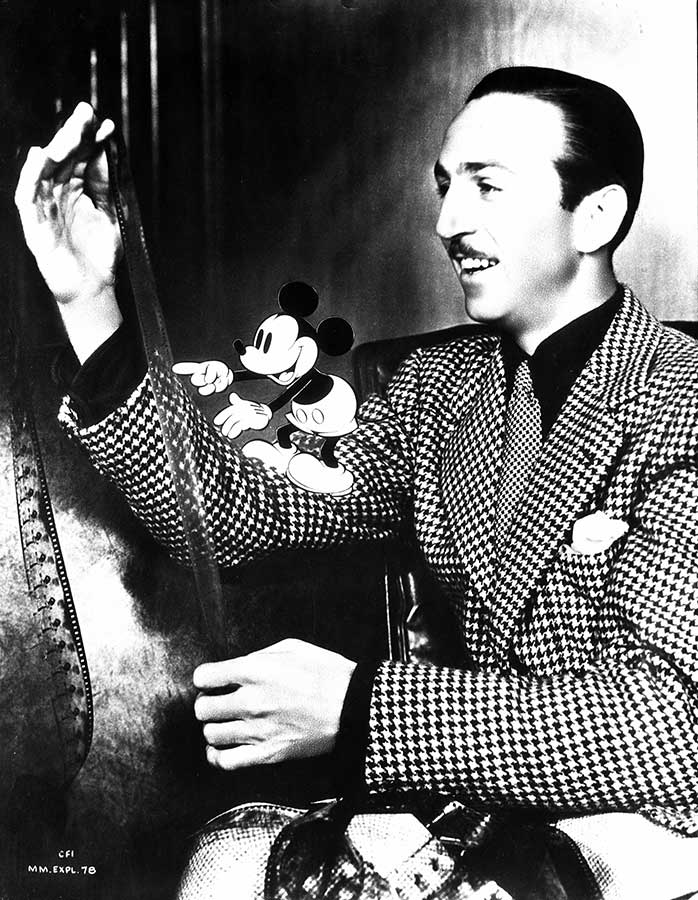 Walt Disney and his alter ego confer in this 1949 publicity pose.
