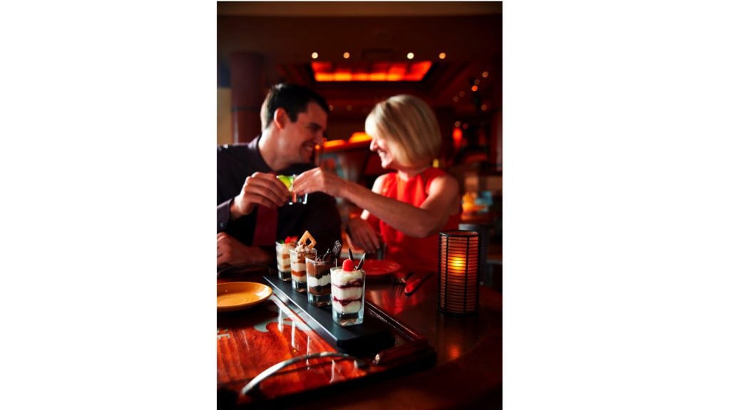 Couple eating at Maya Grill at Disney’s Coronado Springs Resort