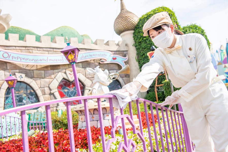 Tokyo Disney Resort cast member cleans as part of enhanced health and safety measures
