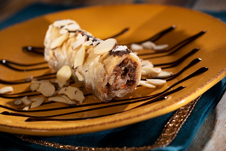 Offerings from Morocco Marketplace for the 2020 Epcot Taste of International Food & Wine Festival - Chocolate Baklava: Rolled Phyllo Dough with Toasted Almonds and Dark Chocolate Sauce 