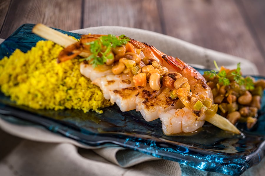 Offerings from Africa Marketplace for the 2020 Epcot Taste of International Food & Wine Festival - Piri Piri Skewered Shrimp with Citrus-Scented Couscous 