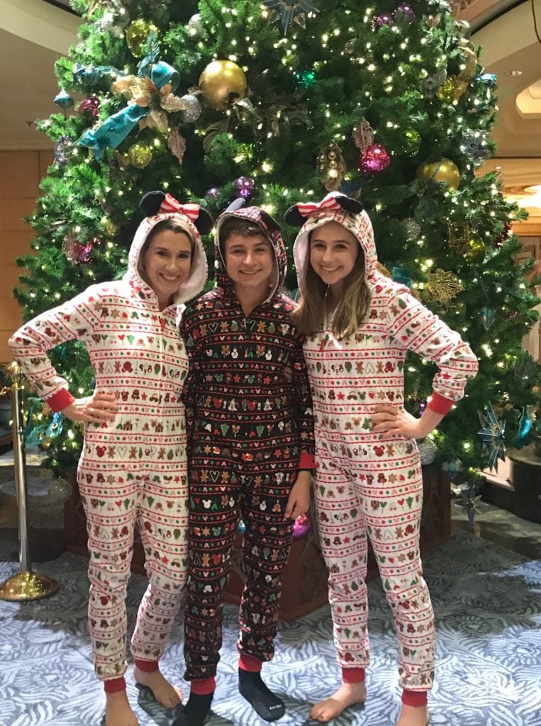 Family in Christmas outfits on a Disney Cruise Line ship