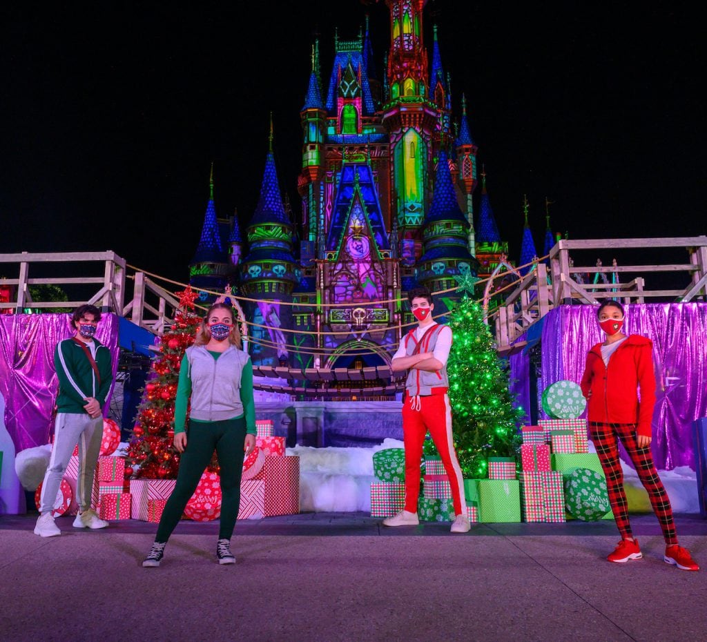Disney Channel’s “ZOMBIES 2" stars, Pearce Joza, Ariel Martin, Milo Manheim, and Kylee Russell, compete in "Disney Holiday Magic Quest," a high-stakes, holiday adventure inside Magic Kingdom Park at Walt Disney World Resort after dark.