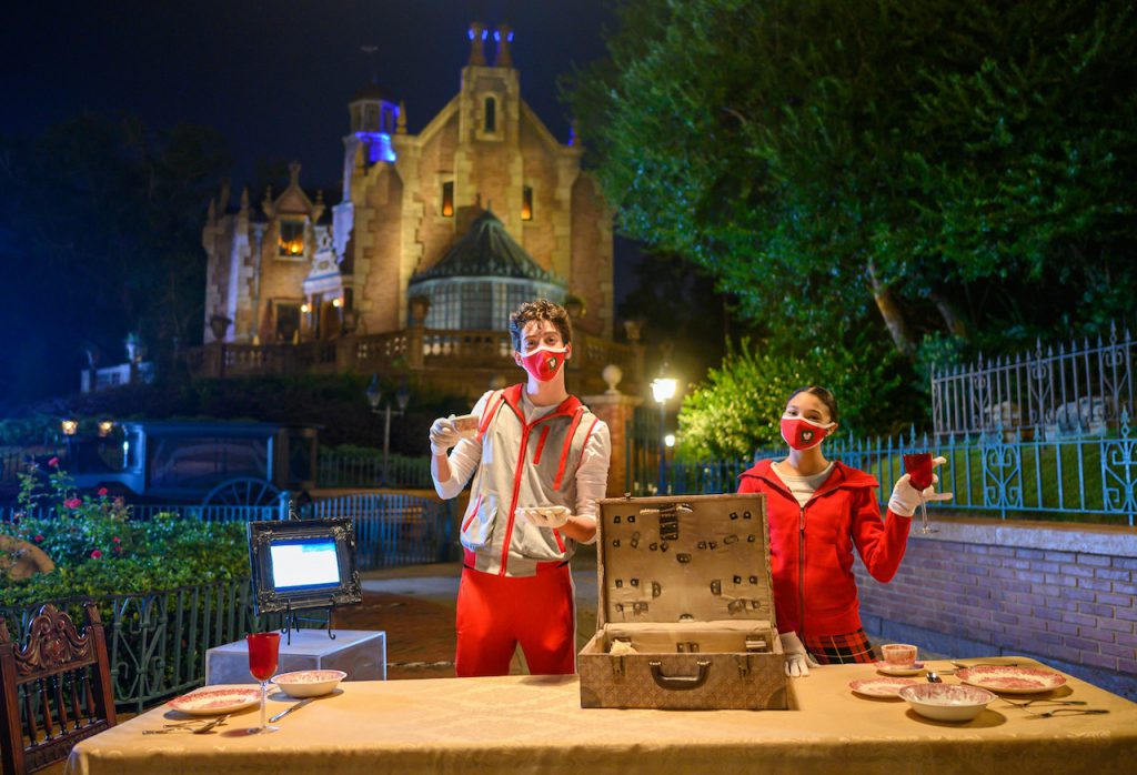 Disney Channel’s “ZOMBIES 2" stars, Milo Manheim and Kylee Russell, compete in "Disney Holiday Magic Quest," a high-stakes, holiday adventure inside Magic Kingdom Park at Walt Disney World Resort after dark.